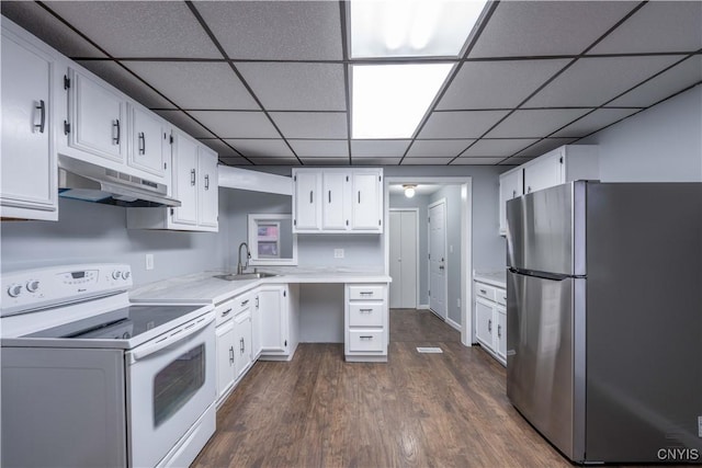 kitchen with stainless steel fridge, white range with electric stovetop, dark wood-type flooring, sink, and white cabinetry