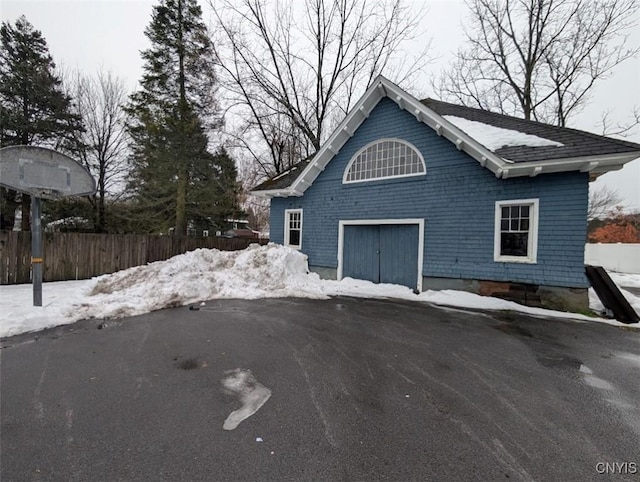 view of snow covered garage