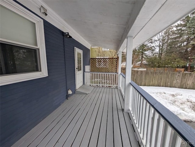 view of snow covered deck