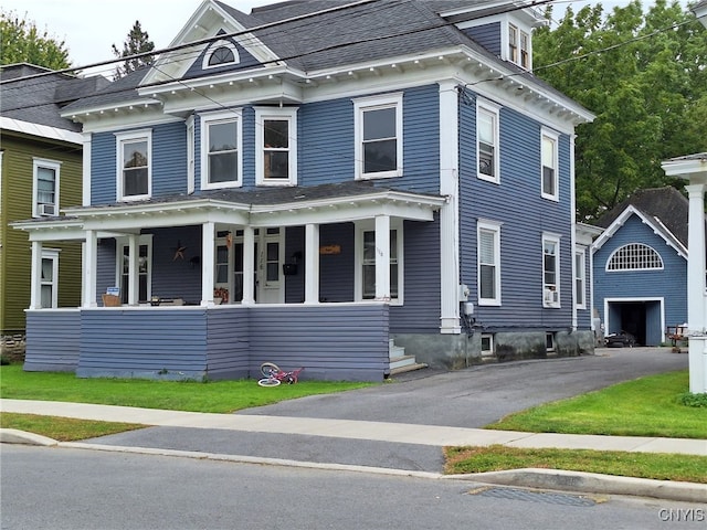 view of front of home featuring covered porch