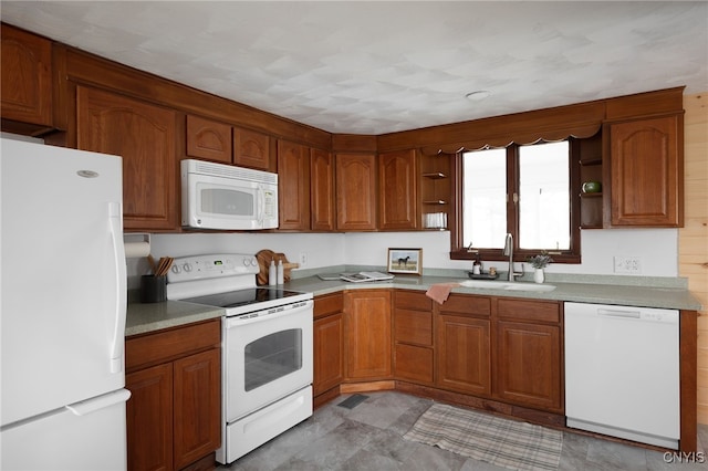 kitchen with white appliances and sink