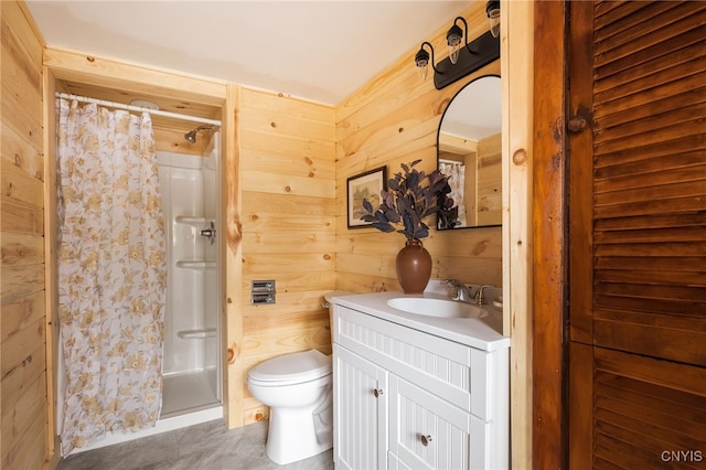 bathroom featuring wooden walls, toilet, vanity, and a shower with shower curtain