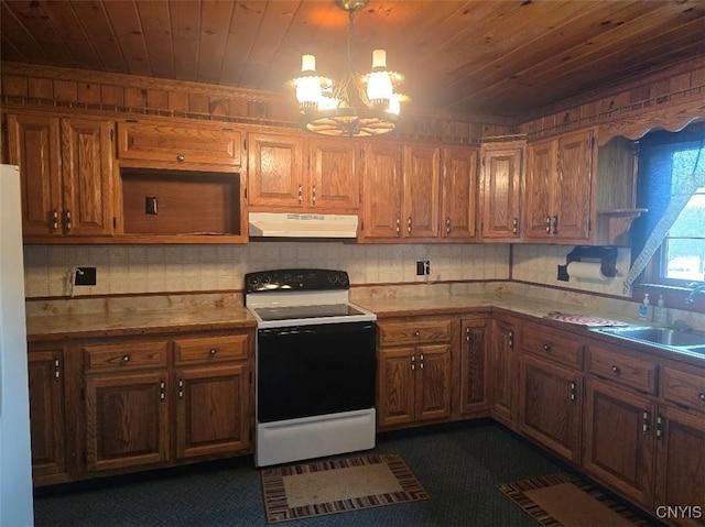 kitchen featuring sink, white electric range oven, dark colored carpet, pendant lighting, and a chandelier