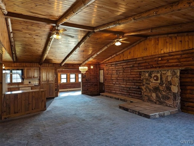 unfurnished living room featuring dark colored carpet, vaulted ceiling with beams, wooden ceiling, and ceiling fan with notable chandelier