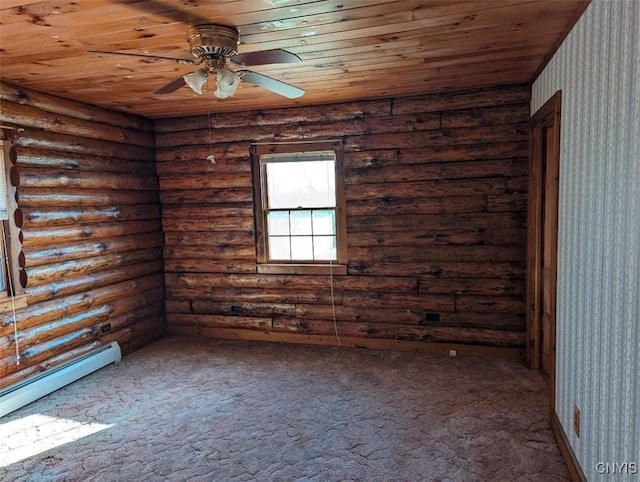 carpeted empty room featuring baseboard heating, rustic walls, ceiling fan, and wood ceiling