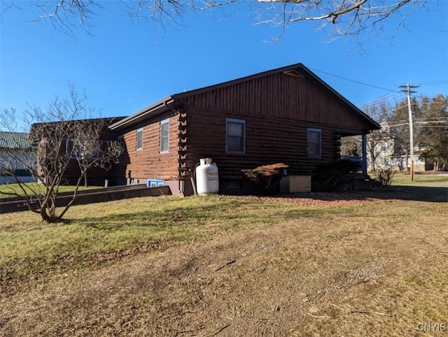 view of property exterior featuring a yard