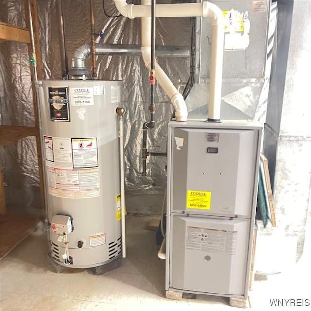 utility room with water heater