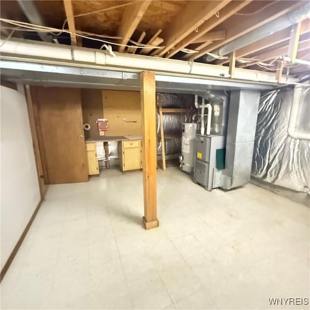 basement with gas water heater and heating unit