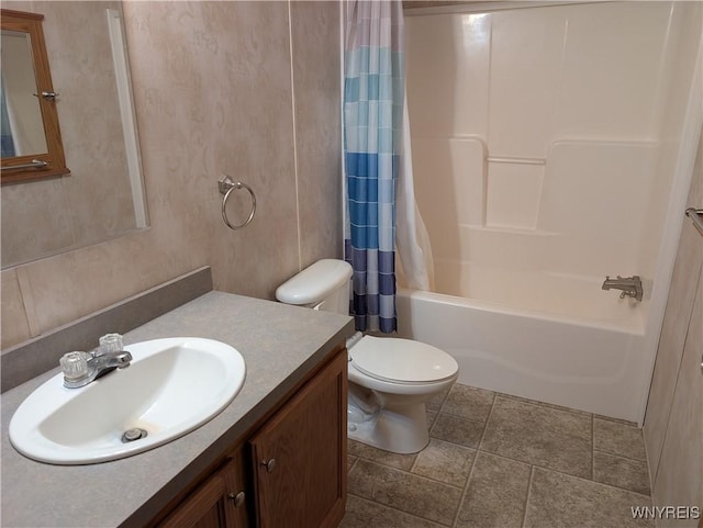 full bathroom featuring shower / bath combo, toilet, and vanity