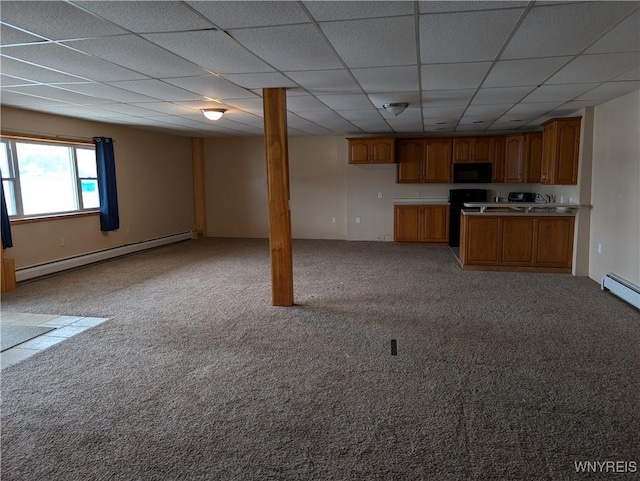 kitchen featuring a paneled ceiling, light colored carpet, baseboard heating, and black appliances