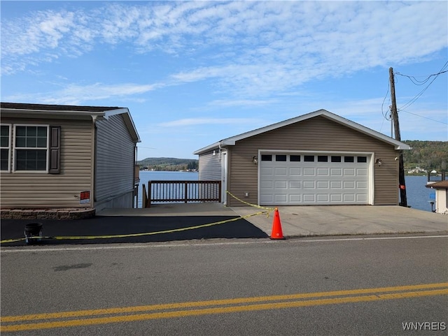 garage featuring a water view