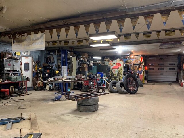 garage with a workshop area