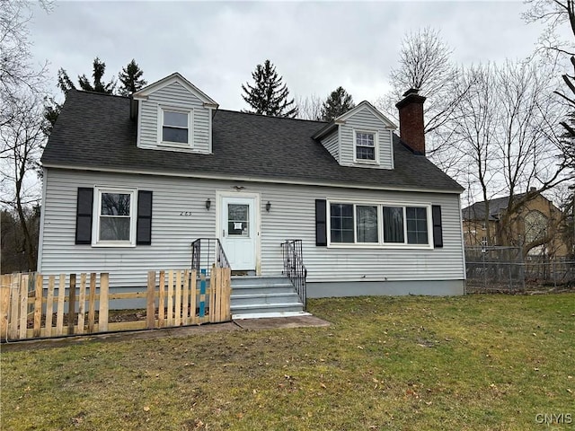 new england style home with a front yard