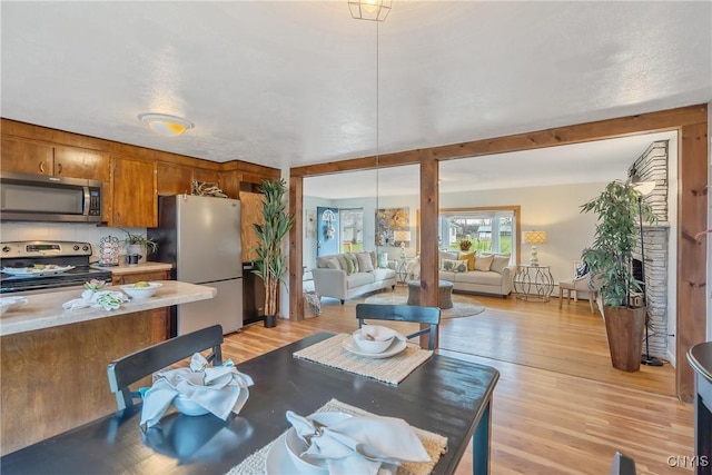 dining area featuring light hardwood / wood-style floors