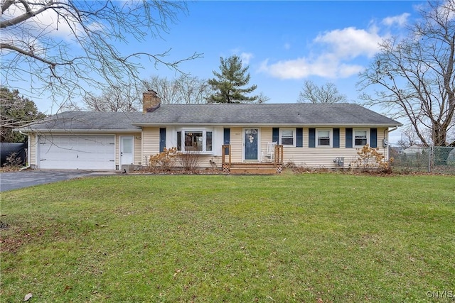 single story home featuring a front yard and a garage