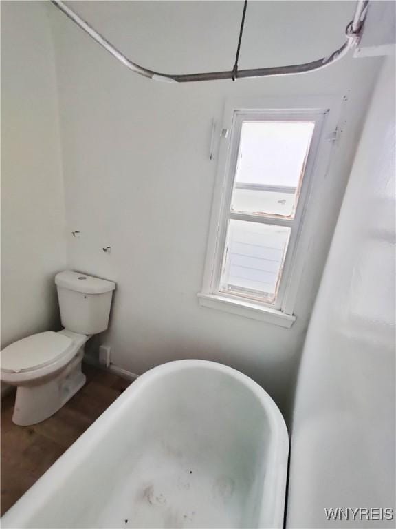 508 Howard St, Buffalo, NY 14206 - full bathroom with a soaking tub, plenty of natural light, and wood finished floors