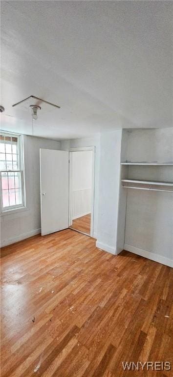 508 Howard St, Buffalo, NY 14206 - unfurnished bedroom with wood finished floors and ceiling fan