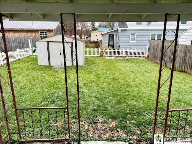 view of yard with a storage unit