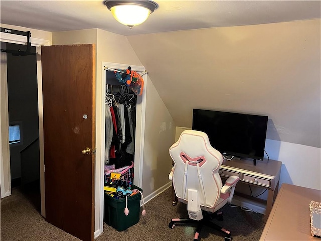 carpeted office space with lofted ceiling