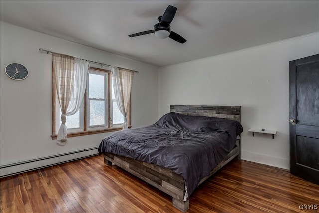 bedroom featuring ceiling fan, a baseboard radiator, and dark hardwood / wood-style floors