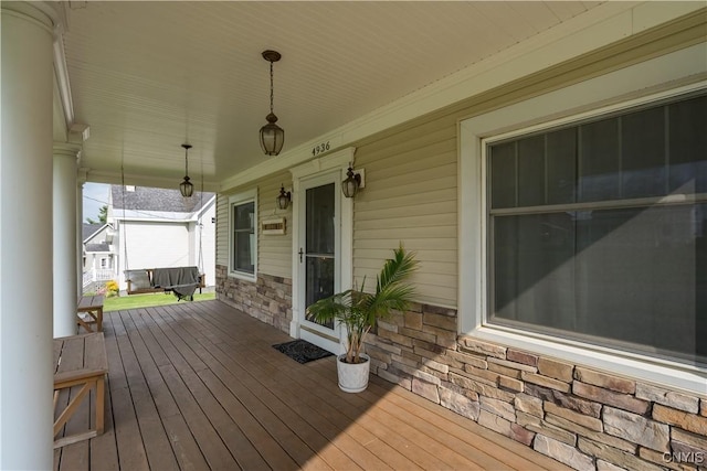 deck with covered porch