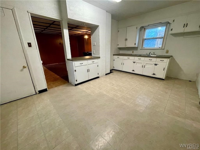 kitchen with white cabinets and sink