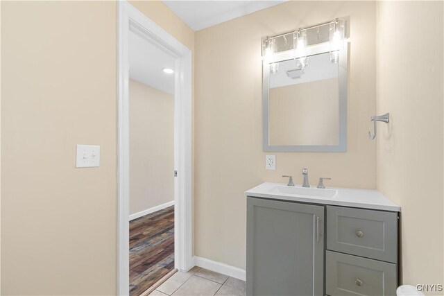 bathroom featuring hardwood / wood-style floors and vanity