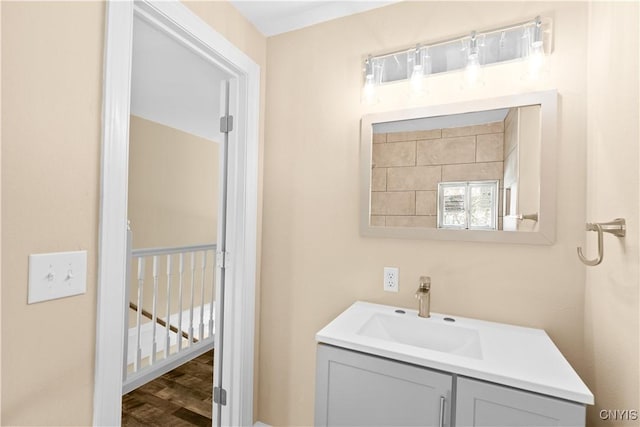 bathroom featuring vanity and wood-type flooring