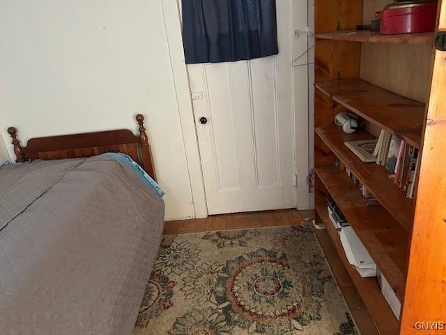 bedroom featuring hardwood / wood-style flooring