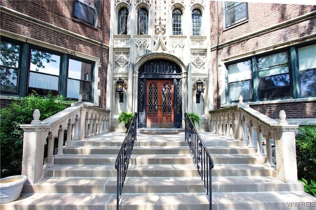 view of exterior entry featuring french doors