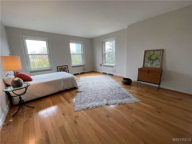 bedroom with light hardwood / wood-style flooring