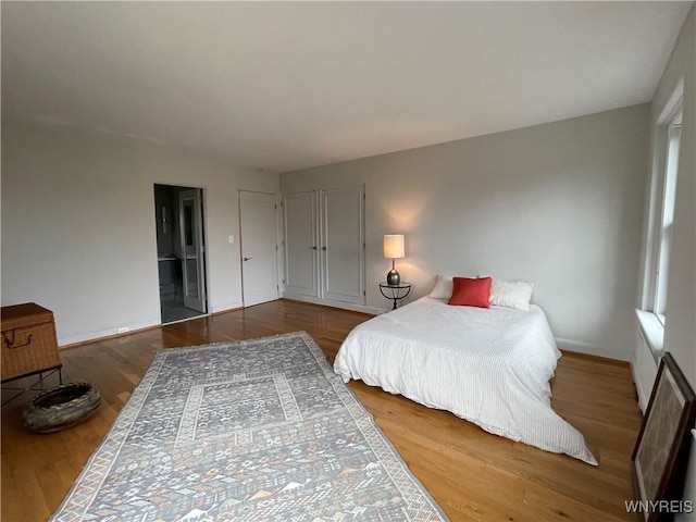 bedroom featuring hardwood / wood-style floors