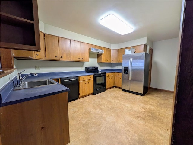 kitchen featuring sink, light colored carpet, and black appliances