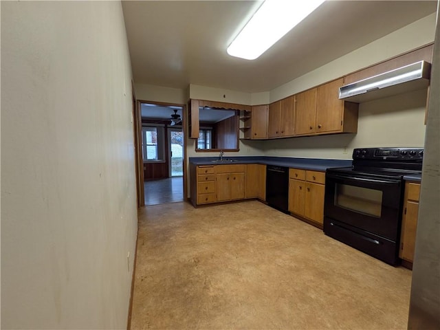 kitchen with sink and black appliances