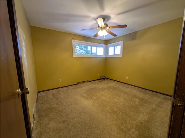 empty room featuring light carpet