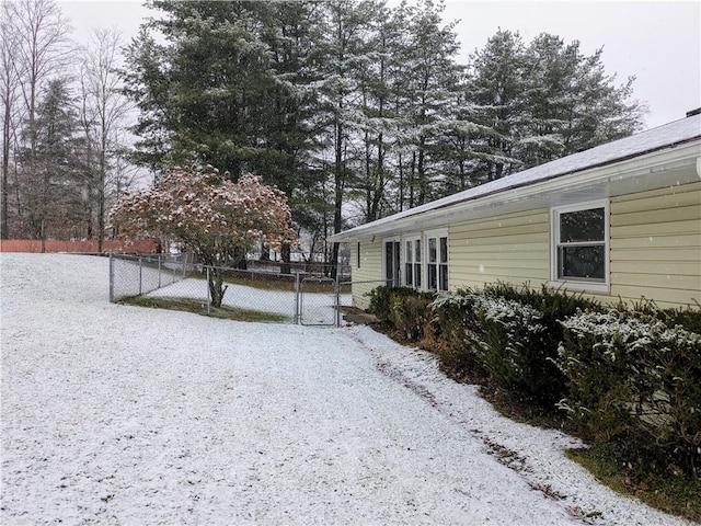 view of yard covered in snow