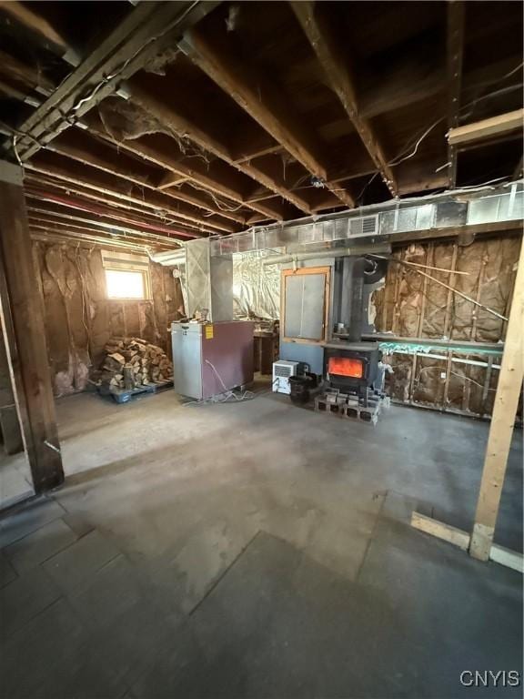 basement featuring heating unit