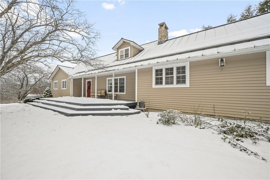 view of snow covered property