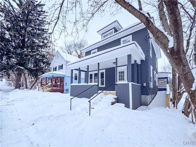 view of snow covered property