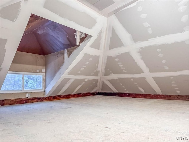 bonus room featuring vaulted ceiling