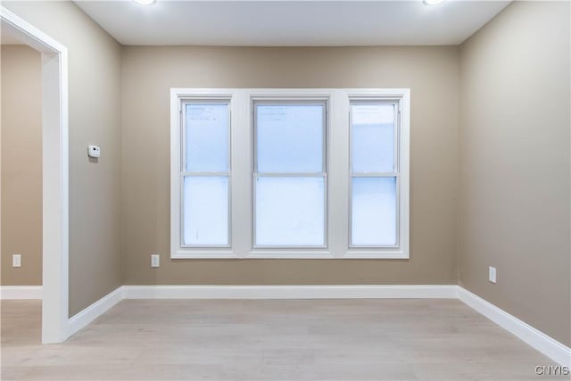 empty room featuring light hardwood / wood-style floors