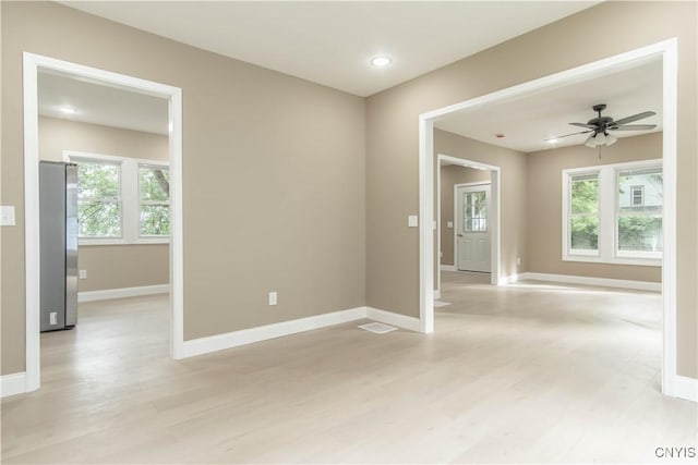 223 S Washington St, Wilna, NY 13619 - spare room with light wood-style floors and a ceiling fan