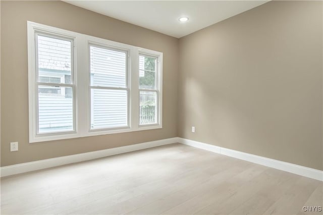 223 S Washington St, Wilna, NY 13619 - empty room featuring light wood-style floors and recessed lighting