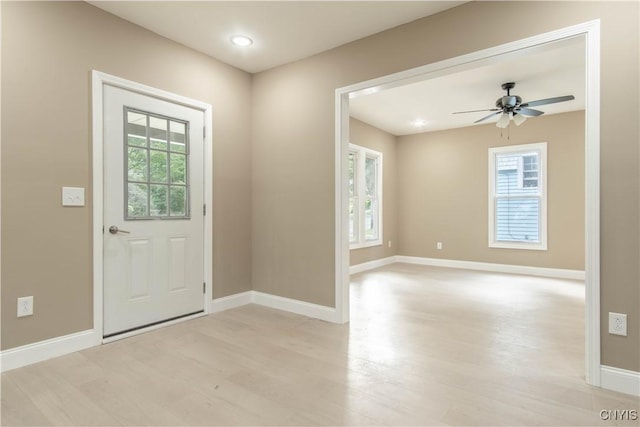 223 S Washington St, Wilna, NY 13619 - entryway with light wood-style floors and a ceiling fan