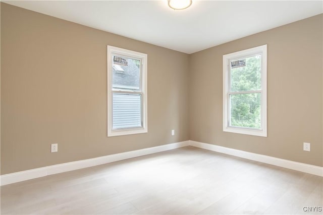 223 S Washington St, Wilna, NY 13619 - spare room with light wood-style floors