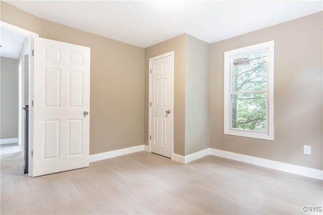 223 S Washington St, Wilna, NY 13619 - unfurnished bedroom featuring light wood finished floors and baseboards