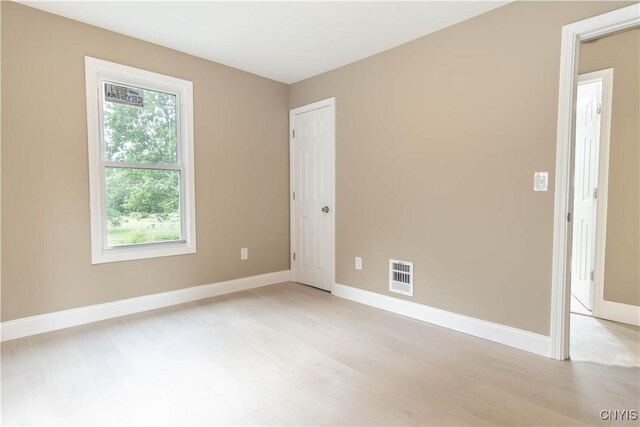 223 S Washington St, Wilna, NY 13619 - empty room with light wood-style flooring and baseboards