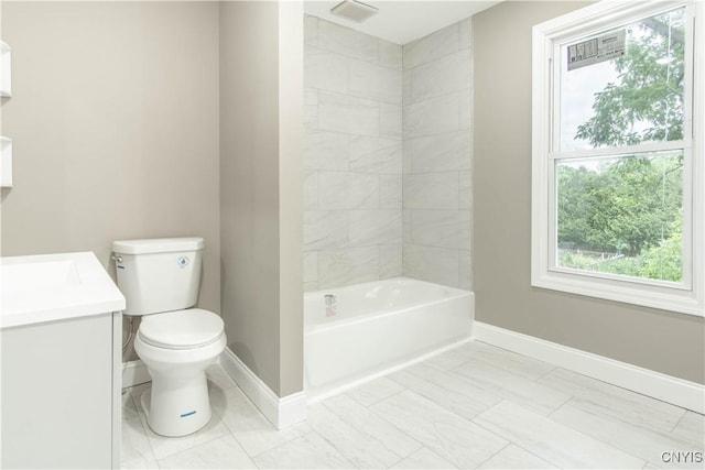 223 S Washington St, Wilna, NY 13619 - full bathroom featuring vanity, plenty of natural light, marble look tiles, and shower / washtub combination