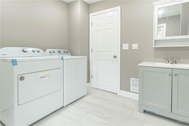 223 S Washington St, Wilna, NY 13619 - laundry area featuring separate washer and dryer and light marble finish flooring
