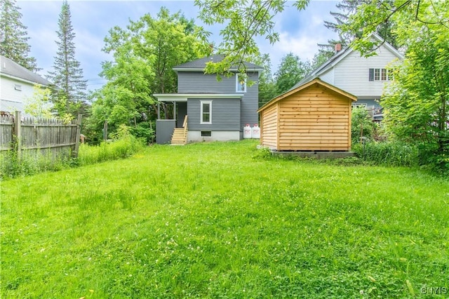 223 S Washington St, Wilna, NY 13619 - rear view of property with a storage shed